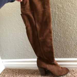 Knee high brown heeled boots
